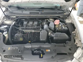 2014 Ford Taurus Limited z VIN 1FAHP2F82EG115503, wystawiony jako Copart lot #64836755 z przebiegiem 111 691 mil mil oraz Szkoda całkowita • Salvage title. Historia ofert i sprzedaży dostępna na DreamBid. Obrazek 11.