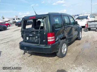 2011 Jeep Liberty Sport 70th Anniversary with VIN 1J4PN2GK4BW560391, listed as a IAAI auction lot 41918406 with 133,391 mi miles. Bid and sale history available at carsss.com. Image 4.