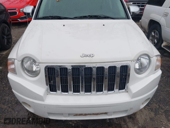 2007 Jeep Compass Sport with VIN 1J8FT47W27D256252, listed as a IAAI auction lot 41616554 with 210,125 mi miles. Bid and sale history available at carsss.com. Image 6.