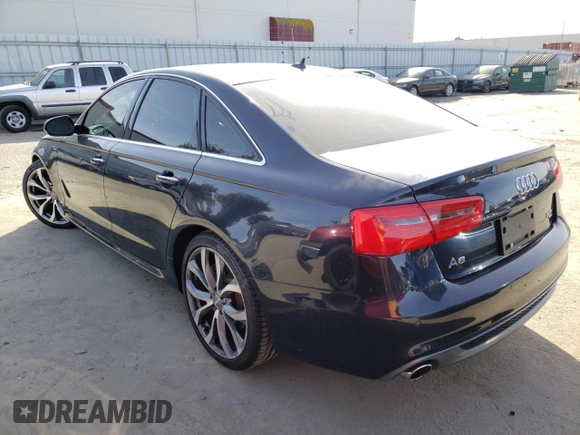 2015 Audi A6 3.0T Prestige with VIN WAUHGAFC1FN007800, listed as a Copart auction lot 68136502 with 88,046 mi miles. Bid and sale history available at carsss.com. Image 2.
