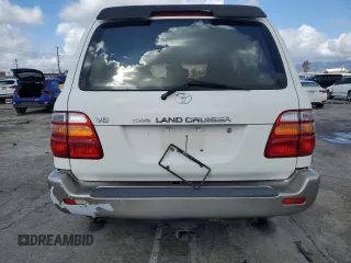 1999 Toyota Land Cruiser with VIN JT3HT05J7X0049786, listed as a Copart auction lot 45527005 with 199,447 mi miles and Salvage Title. Bid and sale history available at carsss.com. Image 6.