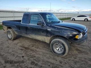 1999 Mazda B-Series 2WD Truck SE with VIN 4F4YR16V7XTM42999, listed as a Copart auction lot 42342714 with 152,152 mi miles and Salvage Title. Bid and sale history available at carsss.com. Image 4.