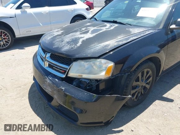 2014 Dodge Avenger SE with VIN 1C3CDZAB1EN133550, listed as a IAAI auction lot 42033001 with 137,592 mi miles. Bid and sale history available at carsss.com. Image 6.