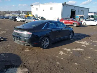 2016 Lincoln MKZ with VIN 3LN6L2J92GR618453, listed as a IAAI auction lot 41545429 with 134,229 mi miles and . Bid and sale history available at DreamBid. Image 4.