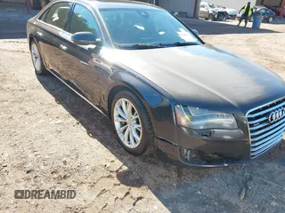 2011 Audi A8 with VIN WAURVAFDXBN014290, listed as a IAAI auction lot 40860777 with 152,584 mi miles and . Bid and sale history available at DreamBid. Image 6.
