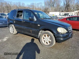 2001 Mercedes-Benz M 320/430/500 with VIN 4JGAB72EX1A277472, listed as a Copart auction lot 86857214 with Not provided miles and Salvage title. Bid and sale history available at DreamBid. Image 4.