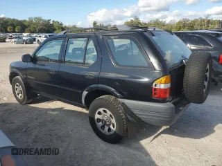1999 Isuzu Rodeo S with VIN 4S2CK58W7X4357230, listed as a Copart auction lot 85214894 with 130,370 mi miles and Salvage title. Bid and sale history available at DreamBid. Image 2.