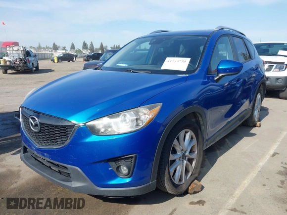 2014 Mazda CX-5 Grand Touring with VIN JM3KE4DY1E0327703, listed as a IAAI auction lot 41755735 with 206,845 mi miles. Bid and sale history available at carsss.com. Image 17.