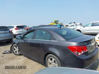 2014 Chevrolet Cruze 1LT with VIN 1G1PC5SB2E7238098, listed as a IAAI auction lot 42577348 with 84,964 mi miles and . Bid and sale history available at DreamBid. Image 3.