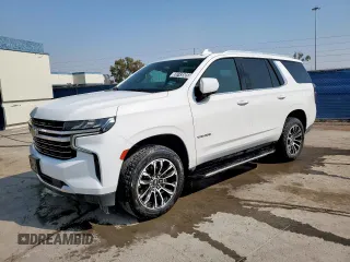 2021 Chevrolet Tahoe LT z VIN 1GNSCNKDXMR263862, wystawiony jako Copart lot #58743585 z przebiegiem 131 743 mil mil oraz Czysty tytuł • Clean title. Historia ofert i sprzedaży dostępna na DreamBid. Obrazek 1.