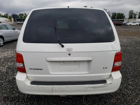 2004 Kia Sedona LX with VIN KNDUP131346544101, listed as a Copart auction lot 72207784 with 0 mi miles and Salvage Title. Bid and sale history available at carsss.com. Image 6.