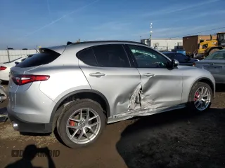 2019 Alfa Romeo Stelvio Ti z VIN ZASPAKBN2K7C40054, wystawiony jako Copart lot #86020774 z przebiegiem 16 135 mil mil oraz Szkody całkowita. Historia ofert i sprzedaży dostępna na DreamBid. Obrazek 3.