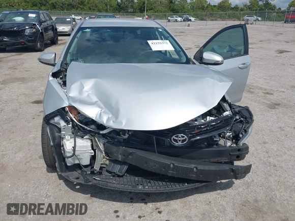 2014 Toyota Corolla L with VIN 5YFBURHE9EP160912, listed as a IAAI auction lot 42159372 with 125,863 mi miles and . Bid and sale history available at DreamBid. Image 6.