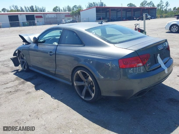 2013 Audi RS 5 with VIN WUAC6AFR2DA900747, listed as a IAAI auction lot 41822517 with 76,468 mi miles. Bid and sale history available at carsss.com. Image 3.