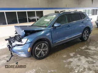 2018 Volkswagen Tiguan SEL with VIN 3VV3B7AX9JM025975, listed as a Copart auction lot 58786895 with 84,778 mi miles and Salvage title. Bid and sale history available at DreamBid. Image 1.