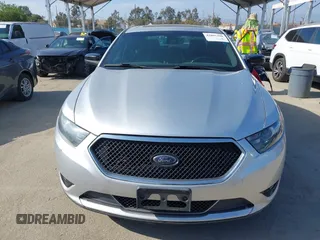 2014 Ford Taurus SHO with VIN 1FAHP2KT8EG123342, listed as a IAAI auction lot 42095390 with 142,957 mi miles. Bid and sale history available at carsss.com. Image 12.