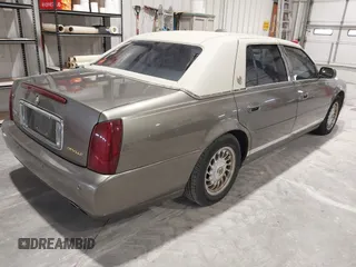 2000 Cadillac DeVille z VIN 1G6KD54Y6YU265538, wystawiony jako IAAI lot #41748755 z przebiegiem 159 676 mil mil oraz . Historia ofert i sprzedaży dostępna na DreamBid. Obrazek 4.