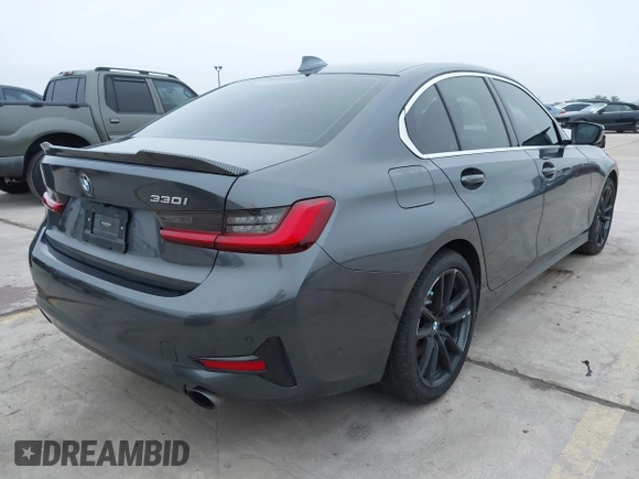 2021 BMW 3 Series 330i with VIN 3MW5R1J09M8C15403, listed as a IAAI auction lot 41892341 with 30,975 mi miles and . Bid and sale history available at carsss.com. Image 4.