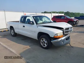 2000 Dodge Dakota with VIN 1B7GL22X0YS705456, listed as a IAAI auction lot 42406392 with 123,168 mi miles and . Bid and sale history available at DreamBid. Image 1.
