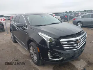 2017 Cadillac XT5 Luxury FWD z VIN 1GYKNBRS7HZ278664, wystawiony jako IAAI lot #42433354 z przebiegiem 119 606 mil mil oraz . Historia ofert i sprzedaży dostępna na DreamBid. Obrazek 1.