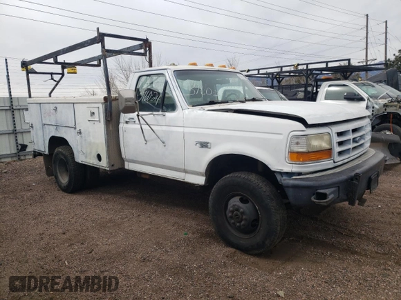 1997 Ford F-350 with VIN 1FDKF38G8VEB54732, listed as a Copart auction lot 50266795 with Not Provided miles and Salvage Title. Bid and sale history available at DreamBid. Image 4.