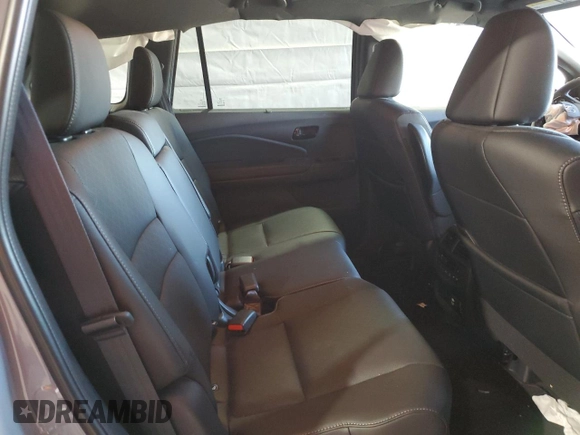 2023 Honda Passport Elite with VIN 5FNYF8H03PB034613, listed as a Copart auction lot 54009215 with 102,841 mi miles and Salvage title. Bid and sale history available at DreamBid. Image 11.