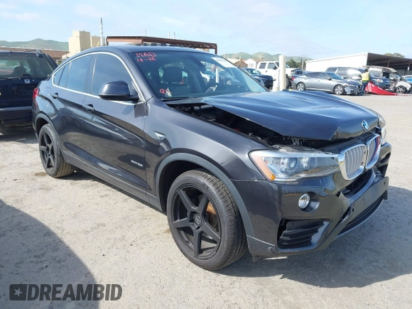 2015 BMW X4 xDrive28i z VIN 5UXXW3C54F0M87412, wystawiony jako IAAI lot #42038938 z przebiegiem 106 461 mil mil oraz . Historia ofert i sprzedaży dostępna na DreamBid. Obrazek 1.