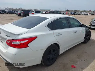 2016 Nissan Altima SV with VIN 1N4AL3AP2GC146486, listed as a IAAI auction lot 41694332 with 135,076 mi miles and . Bid and sale history available at DreamBid. Image 4.