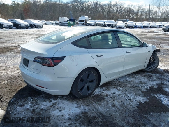 2023 Tesla Model 3 Long Range with VIN 5YJ3E1EBXPF392818, listed as a IAAI auction lot 41346835 with 31,750 mi miles and . Bid and sale history available at DreamBid. Image 4.