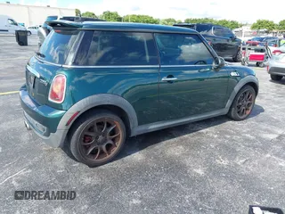 2007 MINI Hardtop S with VIN WMWMF73507TV30183, listed as a IAAI auction lot 42574374 with 90,334 mi miles and . Bid and sale history available at DreamBid. Image 4.