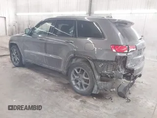 2021 Jeep Grand Cherokee 80th Anniversary z VIN 1C4RJFBG9MC580645, wystawiony jako IAAI lot #41398269 z przebiegiem 79 057 mil mil oraz . Historia ofert i sprzedaży dostępna na DreamBid. Obrazek 3.