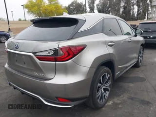 2022 Lexus RX 450h with VIN 2T2HGMDA7NC072735, listed as a IAAI auction lot 42356852 with 62,835 mi miles and . Bid and sale history available at DreamBid. Image 4.