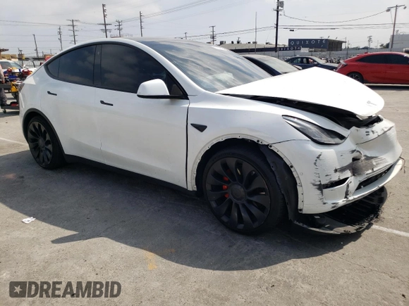 2022 Tesla Model Y Performance with VIN 7SAYGDEF6NF493231, listed as a Copart auction lot 52336284 with 37,116 mi miles and Salvage title. Bid and sale history available at DreamBid. Image 4.