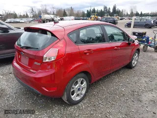 2016 Ford Fiesta SE with VIN 3FADP4EJ3GM198611, listed as a IAAI auction lot 41819332 with 122,700 mi miles. Bid and sale history available at carsss.com. Image 4.