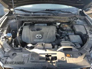 2015 Mazda CX-5 Sport z VIN JM3KE2BE5F0472631, wystawiony jako Copart lot #48559145 z przebiegiem 115 353 mil mil oraz Czysty tytuł • Clean title. Historia ofert i sprzedaży dostępna na DreamBid. Obrazek 12.