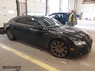 2015 Audi A7 3.0 Premium Plus with VIN WAUWGAFC2FN011927, listed as a IAAI auction lot 41846990 with 98,051 mi miles. Bid and sale history available at carsss.com. Image 1.