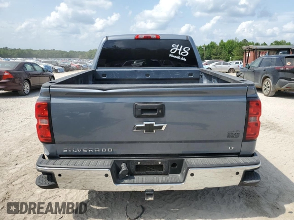2015 Chevrolet Silverado 1500 LT with VIN 3GCUKREC2FG415389, listed as a Copart auction lot 53994135 with 148,655 mi miles and Salvage Title. Bid and sale history available at DreamBid. Image 6.