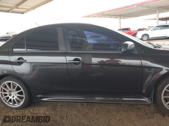 2013 Mitsubishi Lancer Evolution GSR with VIN JA32W8FV6DU009257, listed as a IAAI auction lot 41917942 with 125,279 mi miles. Bid and sale history available at carsss.com. Image 13.