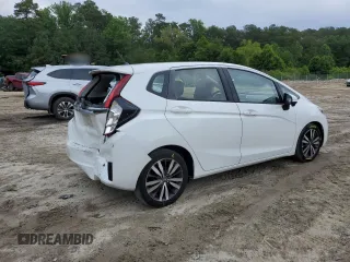 2016 Honda Fit EX with VIN JHMGK5H76GS004073, listed as a Copart auction lot 60194115 with 189,283 mi miles and Salvage title. Bid and sale history available at DreamBid. Image 3.