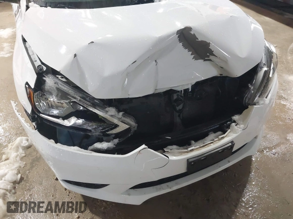 2019 Nissan Sentra S z VIN 3N1AB7APXKY240431, wystawiony jako IAAI lot #41722182 z przebiegiem 81 450 mil mil oraz . Historia ofert i sprzedaży dostępna na DreamBid. Obrazek 6.