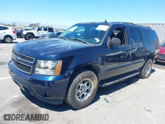 2007 Chevrolet Suburban LS with VIN 1GNFC16077J315274, listed as a IAAI auction lot 42629624 with 217,224 mi miles and . Bid and sale history available at DreamBid. Image 2.