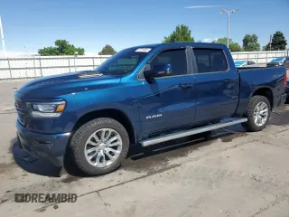 2023 Ram 1500 Laramie with VIN 1C6SRFJT7PN639488, listed as a Copart auction lot 57076955 with 11,613 mi miles and Salvage title. Bid and sale history available at DreamBid. Image 1.