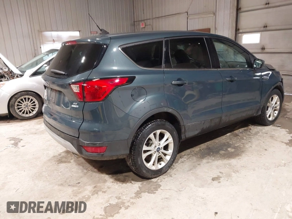 2019 Ford Escape SE z VIN 1FMCU9GDXKUA54699, wystawiony jako IAAI lot #41667188 z przebiegiem 127 376 mil mil oraz . Historia ofert i sprzedaży dostępna na DreamBid. Obrazek 4.