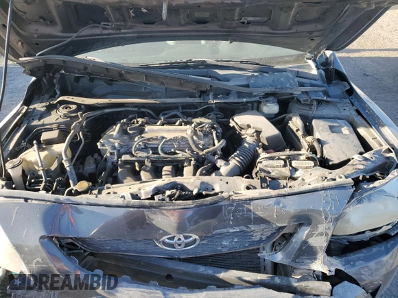 2010 Toyota Corolla with VIN 2T1BU4EE1AC363990, listed as a Copart auction lot 52001595 with 244,000 mi miles and Salvage title. Bid and sale history available at DreamBid. Image 11.