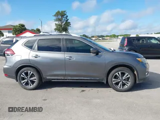 2018 Nissan Rogue S with VIN 5N1AT2MT9JC834646, listed as a IAAI auction lot 41224194 with 87,846 mi miles and . Bid and sale history available at carsss.com. Image 13.