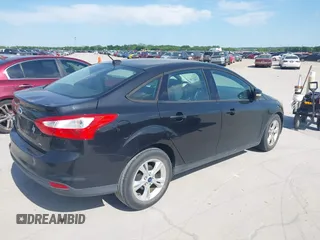 2013 Ford Focus SE with VIN 1FADP3F28DL302475, listed as a IAAI auction lot 42046024 with 110,446 mi miles. Bid and sale history available at carsss.com. Image 4.