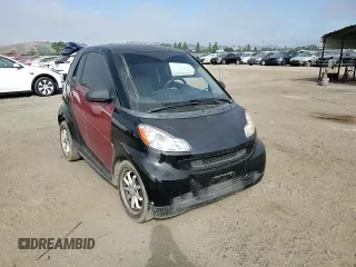 2014 Smart fortwo Pure z VIN WMEEJ3BA1EK753320, wystawiony jako Copart lot #55665555 z przebiegiem 71 305 mil mil oraz Szkody całkowita. Historia ofert i sprzedaży dostępna na DreamBid. Obrazek 13.