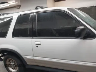 2000 Ford Explorer z VIN 1FMYU60XXYUA34664, wystawiony jako IAAI lot #41980401 z przebiegiem 179 946 mil mil oraz . Historia ofert i sprzedaży dostępna na DreamBid. Obrazek 13.