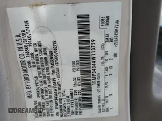 2004 Ford Focus SE with VIN 1FAFP34344W113759, listed as a Copart auction lot 51386335 with 148,267 mi miles and Salvage title. Bid and sale history available at DreamBid. Image 14.