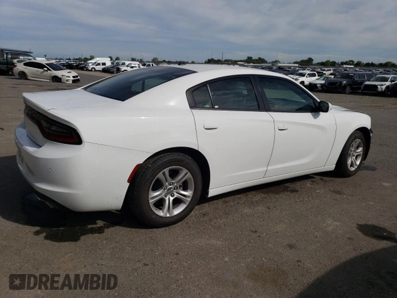 2022 Dodge Charger SXT with VIN 2C3CDXBG9NH212598, listed as a Copart auction lot 52909355 with 66,773 mi miles and Clean Title. Bid and sale history available at DreamBid. Image 3.